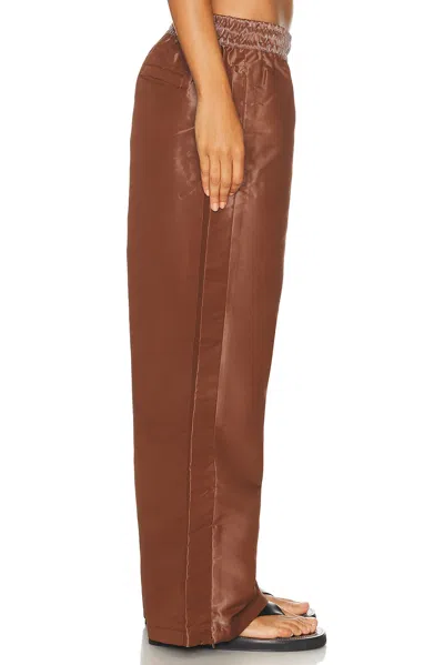 Nike Liquid Shine Pant In Brown
