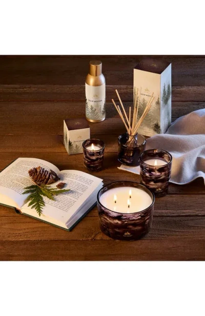 Thymes Noir Woods Votive Candle In Black