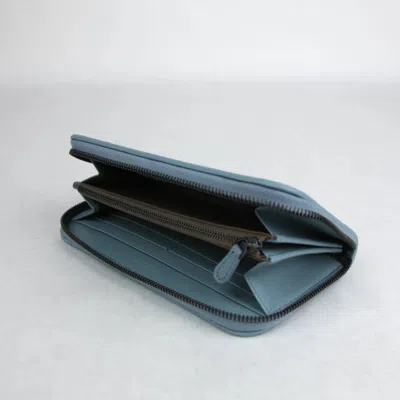 Bottega Veneta Light Blue Leather Woven Zip Around Wallet In Blue