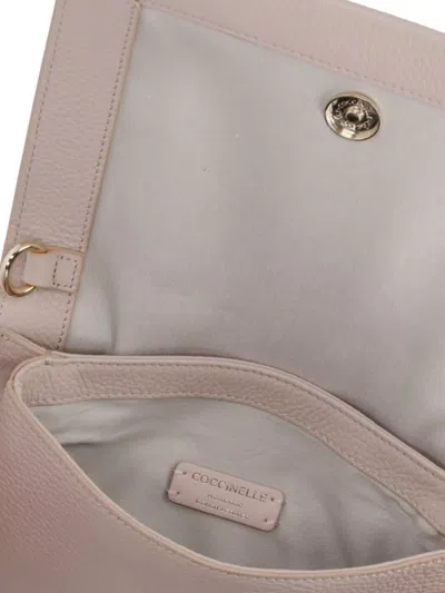 Coccinelle Chain Strap Pebbled Leather Shoulder Bag In Pink