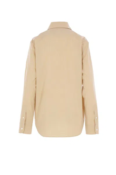 The Row Collared Long Sleeve Button Front Shirt In Nude