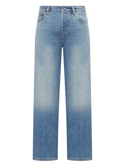 Gucci Blue Jeans With Logo Patch On The Rear And Faded Effect In Denim Woman