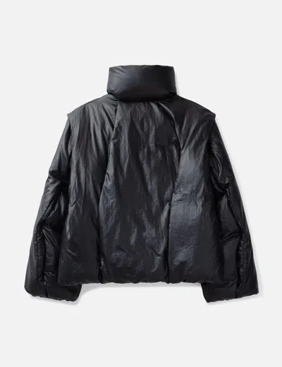 Songzio Asymmetric Cut Down Jumper In Black