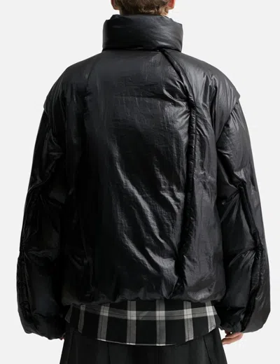 Songzio Asymmetric Cut Down Jumper In Black