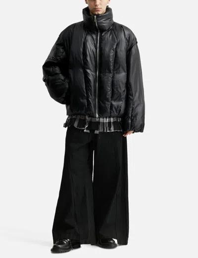 Songzio Asymmetric Cut Down Jumper In Black