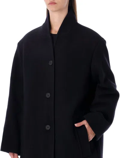 Studio Nicholson Long Coat With Structured Shoulders And Pockets In Black