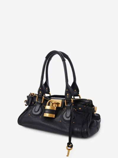 Chloé Structured Shoulder Bag With Padlock And Studs In Black