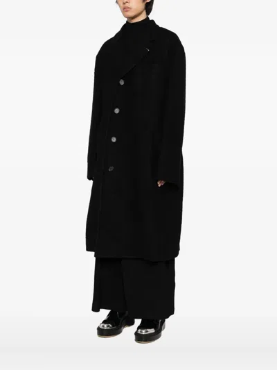 Songzio Single-breasted Coat In Black