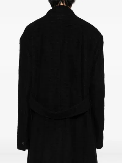 Songzio Single-breasted Coat In Black