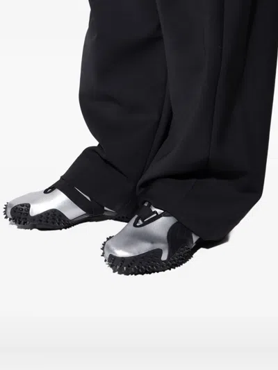 Puma Mostro Metallic Low-top Sneakers In Black