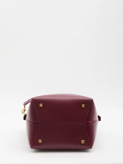 Saint Laurent Le 37 Cassandre-hook Leather Bucket Bag In Red