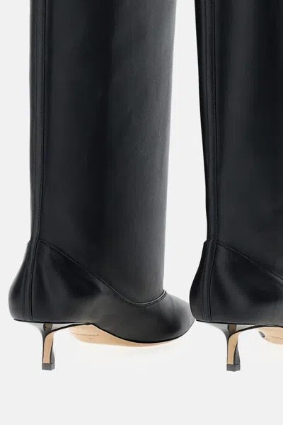 Jacquemus Tourni Boots In Black
