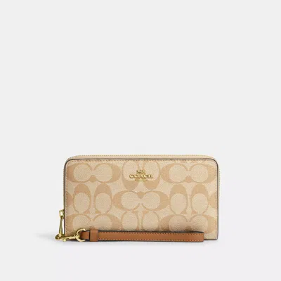 Coach Outlet Long Zip Around Wallet In Signature Canvas In Brown