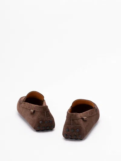 Tod's Gommino Shearling-lined Loafers In Brown