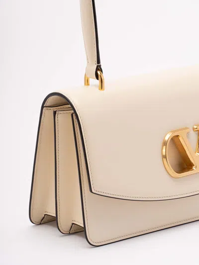 Valentino Garavani  Garavani Vain Bag With Handle In Shiny Calfskin Woman Butter Uni In White