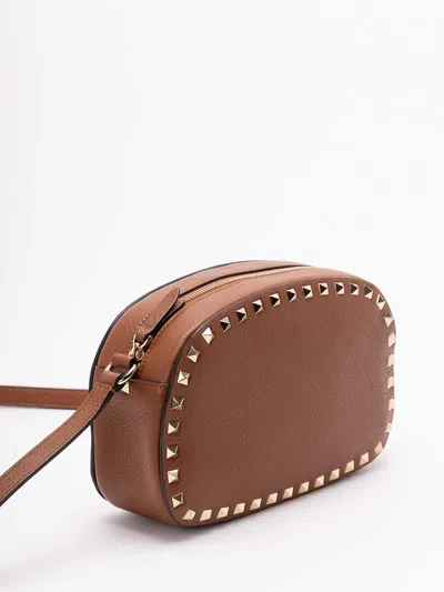 Valentino Studded Leather Crossbody Bag With Chain Strap In Brown