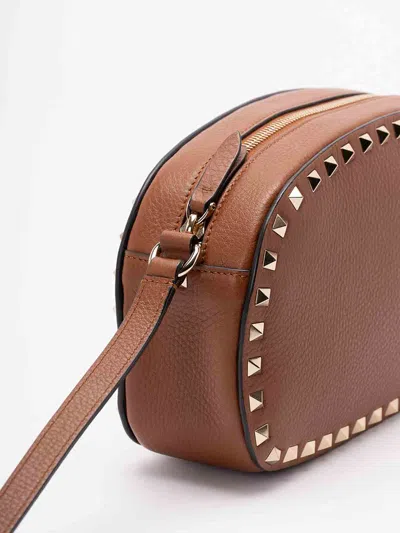 Valentino Studded Leather Crossbody Bag With Chain Strap In Brown