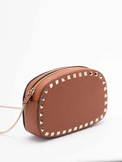 Valentino Studded Leather Crossbody Bag With Chain Strap In Brown