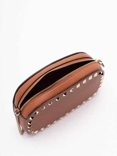 Valentino Studded Leather Crossbody Bag With Chain Strap In Brown