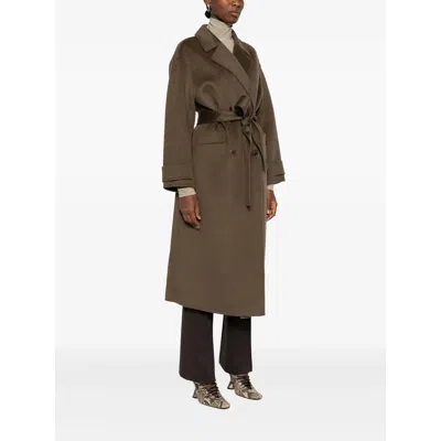 The Dynamis Studio Brown Coats In Brown
