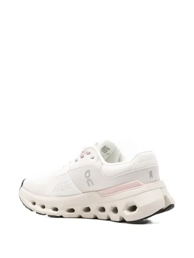 On Perforated Trainers In White