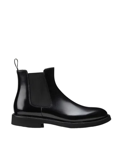 Doucal's Polished Leather Ankle Boots With Elastic Side Panels In Black