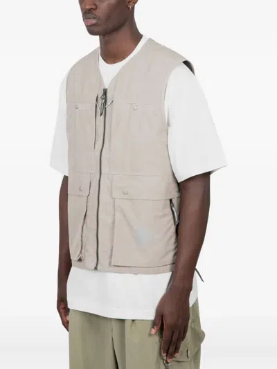 And Wander Zip-front Pocketed Vest In Neutral