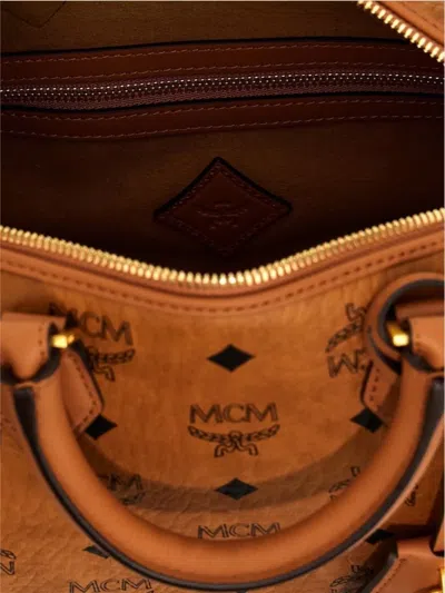 Mcm Shoulder Bag With Adjustable Strap And Top Handle In Brown