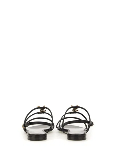 Saint Laurent Flat Sandal "cassandra" In Black