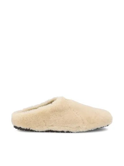 Prada Triangle-logo Shearling Mules In Nude