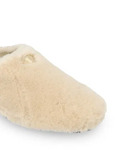Prada Triangle-logo Shearling Mules In Nude