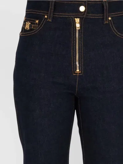 Amiri Flared Jean Featuring Five-pocket Style In Black