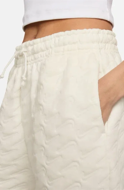 Nike Swoosh Jacquard Phoenix Fleece Joggers In White