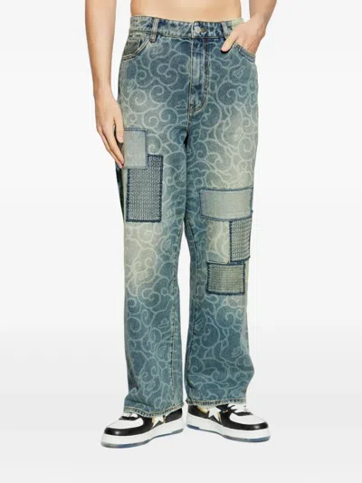 A Bathing Ape Abstract-pattern Patchwork Jeans In Blue