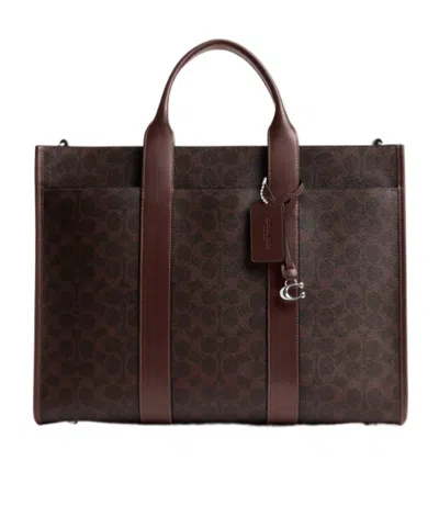 Coach Wesley Tote In Signature Canvas In Brown