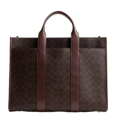 Coach Wesley Tote In Signature Canvas In Brown