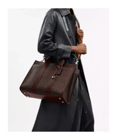Coach Wesley Tote In Signature Canvas In Brown