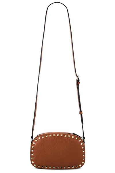 Valentino Rockstud Camera Case Bag In Brown