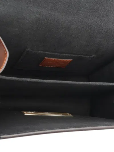 Pre-owned Louis Vuitton 2021-2025 Monogram Reverse Mini Dauphine Satchel In Brown