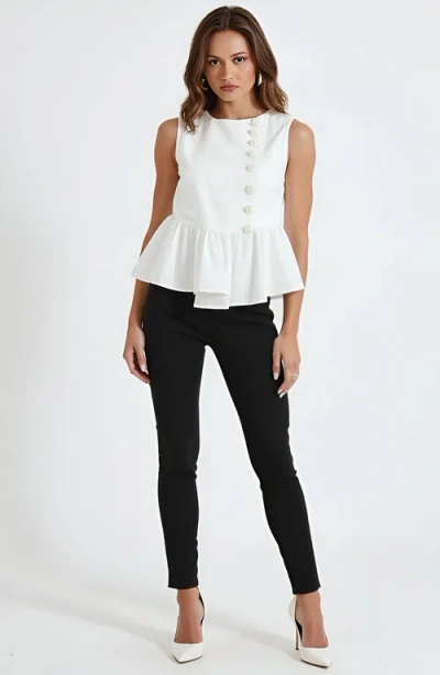 Modenaire Sleeveless Peplum Top With Asymmetric Pearl Button Front In White