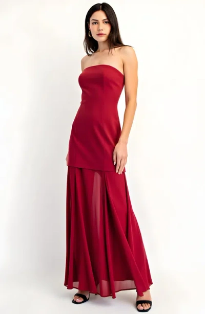 Modenaire Strapless Evening Gown With Sheer Panel Skirt And Fitted Bodice In Red