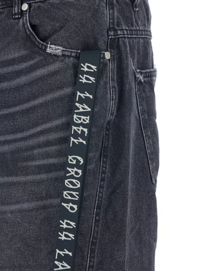 44 Label Group Men Black Jeans With Logo Patch On The Rear And Side Strap With Logo In Denim Man In Black
