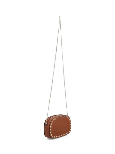 Valentino Rockstud Mini Grainy Leather Crossbody In Brown