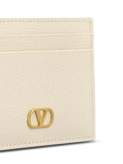 Valentino Garavani Textured Leather Wallet With Logo Embellishment In Neutral