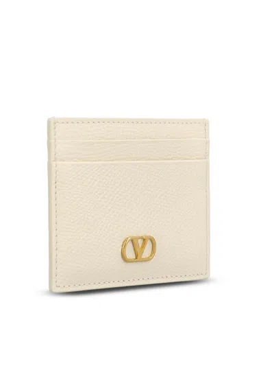 Valentino Garavani Textured Leather Wallet With Logo Embellishment In Neutral