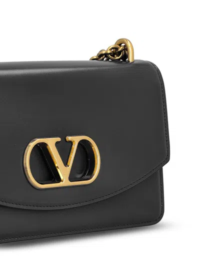 Valentino Garavani Vain Leather Crossbody Bag In Black