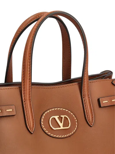 Valentino Vlogo Small Leather Tote In Brown