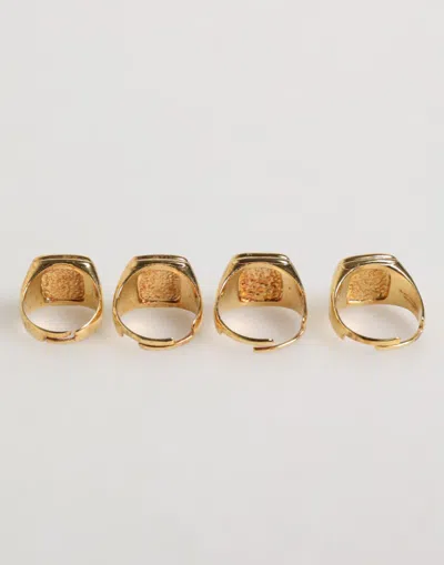 Pre-owned Dolce & Gabbana Gold Tone Brass Jazz Letter Set 4 Pieces Adjustable Men's Ring () In Multi