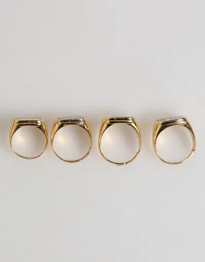Pre-owned Dolce & Gabbana Gold Tone Brass Jazz Letter Set 4 Pieces Adjustable Men's Ring () In Multi