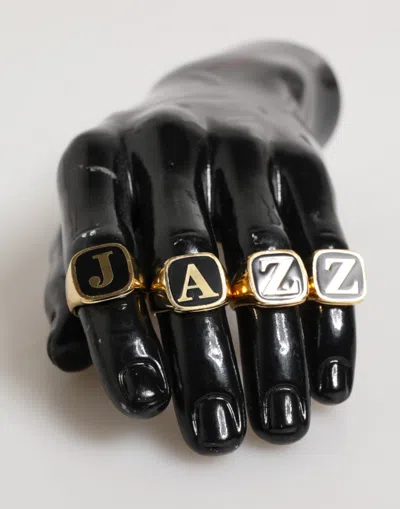 Pre-owned Dolce & Gabbana Gold Tone Brass Jazz Letter Set 4 Pieces Adjustable Men's Ring () In Multi
